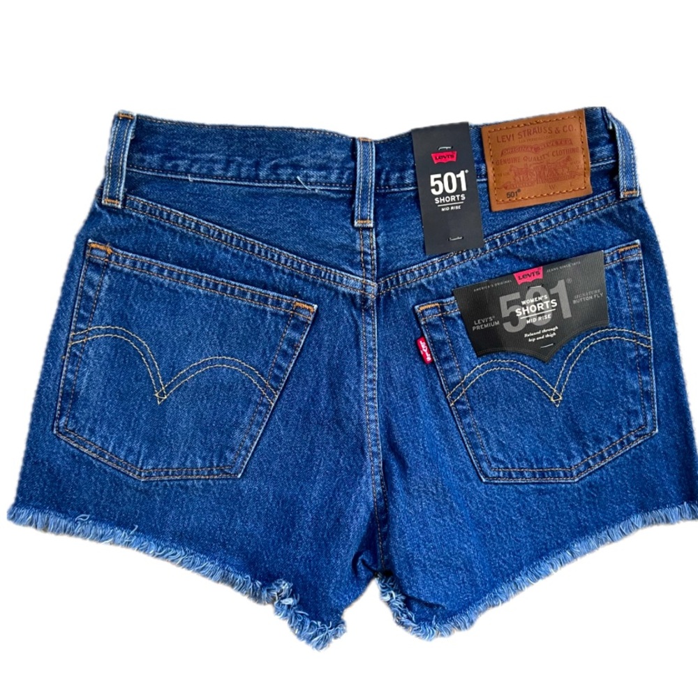 Brand new with tags! Levi’s 501 denim cut off shorts, mid rise. Size 25.